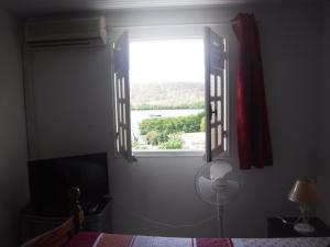 Una cama o camas en una habitación de MANIKOU