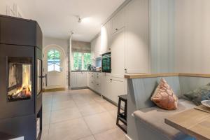 Kuchyň nebo kuchyňský kout v ubytování Inselliebe Exklusive Sylter Wellnessoase mit Sauna Garten in Keitum