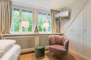 Posezení v ubytování Inselliebe Exklusive Sylter Wellnessoase mit Sauna Garten in Keitum