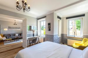 Postel nebo postele na pokoji v ubytování Hotel Villa Wahnfried Thiessow