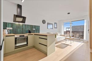 Modern Apt with AC and Balcony 주방 또는 간이 주방