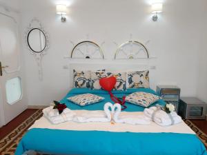 Postel nebo postele na pokoji v ubytování B&B Vista Mare + 37 fotografií