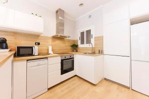 Una cocina o zona de cocina en Bravissimo Apartaments Mora 4