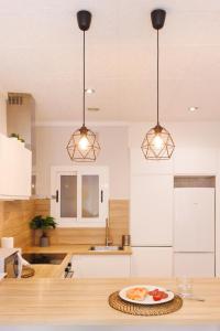 Una cocina o zona de cocina en Bravissimo Apartaments Mora 4