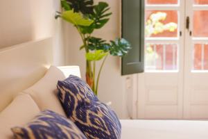 Cama o camas de una habitación en Bravissimo Apartaments Mora 4
