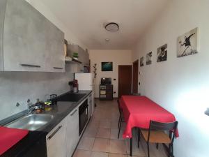 Kuchyňa alebo kuchynka v ubytovaní La Casa dei Bersaglieri