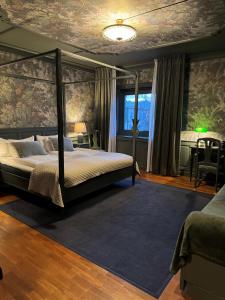 Posteľ alebo postele v izbe v ubytovaní Hotel Jämteborg