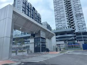 a building in a city with tall buildings at Admiral 3-Bedroom Retreat in Kota Laksamana Jonker in Melaka