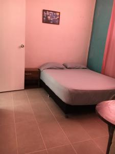 Hotel Pelman客房内的一张或多张床位