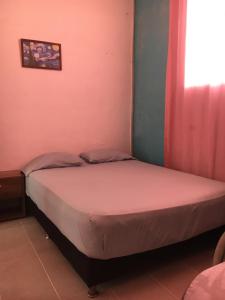 Hotel Pelman客房内的一张或多张床位