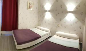 Postel nebo postele na pokoji v ubytování hotel saint fracois xavier