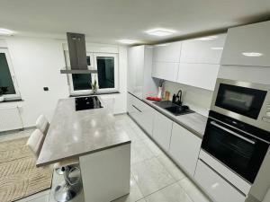 Η κουζίνα ή μικρή κουζίνα στο Luxus Reihenmittelhaus +6 φωτογραφίες