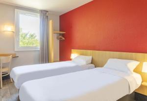 Postel nebo postele na pokoji v ubytování B&B HOTEL Toulon Ollioules