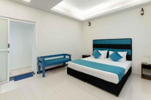 Beach Corridor Hotel & Spa with Free Airport shuttle客房内的一张或多张床位