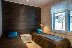 Ένα ή περισσότερα κρεβάτια σε δωμάτιο στο Rukankarhu Apartment II