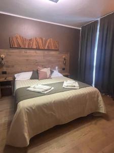 Letto o letti in una camera di Room4You
