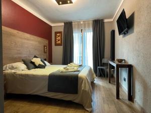 Letto o letti in una camera di Room4You