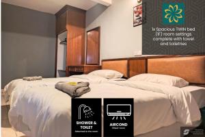 Postel nebo postele na pokoji v ubytování Thara Hotel & Resort