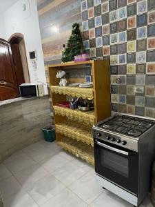 Η κουζίνα ή μικρή κουζίνα στο El Hady luxury apartment with swimming pool