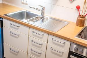 Kuchyň nebo kuchyňský kout v ubytování Das Ferienhaus Oberstdorf + 24 fotografií