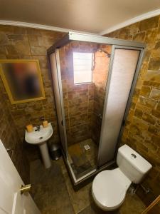 Um banheiro em Hostal Perita