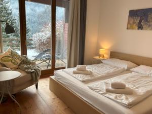 Postel nebo postele na pokoji v ubytování Family Apartment HIRSCH