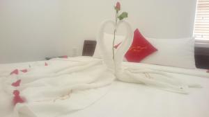 Кровать или кровати в номере Yen Huynh Guest House