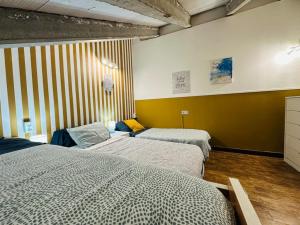 Giường trong phòng chung tại Casa Rural a 4km de Murcia con piscina y spa caliente +93 ảnh