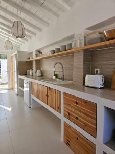 Η κουζίνα ή μικρή κουζίνα στο Casa Oasis by Sesimbra Sun Sea