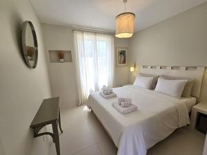 Ένα ή περισσότερα κρεβάτια σε δωμάτιο στο Casa Oasis by Sesimbra Sun Sea +75 φωτογραφίες