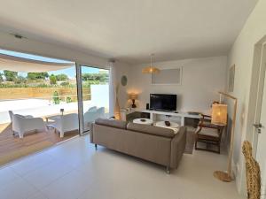 Μια τηλεόραση ή/και κέντρο ψυχαγωγίας στο Casa Oasis by Sesimbra Sun Sea