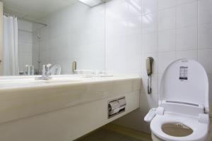 Koupelna v ubytování Libero Hotel + 16 fotografií