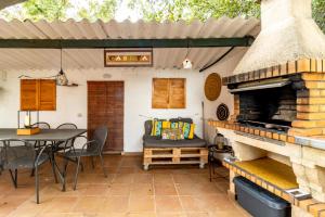 Φωτογραφία από το άλμπουμ του Ca La Iaia Casa con piscina y jardín στη Χιρόνα