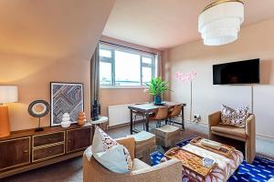 TV a/nebo společenská místnost v ubytování Stylish Boutique Apartment + 21 fotografií
