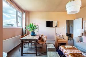 TV a/nebo společenská místnost v ubytování Stylish Boutique Apartment