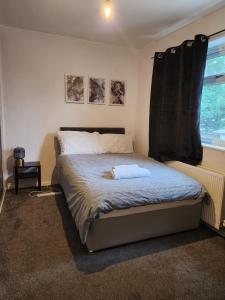 Ένα ή περισσότερα κρεβάτια σε δωμάτιο στο Heronsgate GH017