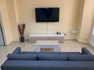 Televízia a/alebo spoločenská miestnosť v ubytovaní Apartamento Marín García C - Centro Histórico