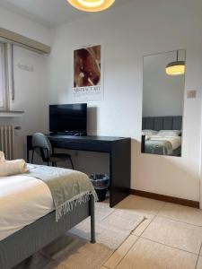 TV a/nebo společenská místnost v ubytování Arlon - Guest House