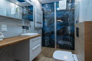 Kúpeľňa v ubytovaní LTC - Apartments Świętego Piotra + 31 fotografií