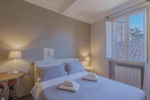 Voodi või voodid majutusasutuse TERRAZZA COCCODE' spazioso con vista mozzafiato! toas