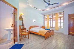 Postel nebo postele na pokoji v ubytování Uns Hotel - Bali