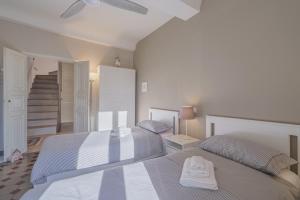 Voodi või voodid majutusasutuse TERRAZZA COCCODE' spazioso con vista mozzafiato! toas