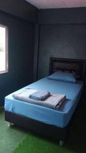Postel nebo postele na pokoji v ubytování Banphe​ Hostel + 24 fotografií
