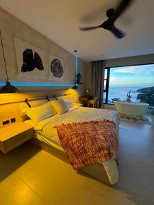 Giường trong phòng chung tại Malibu at Pacific Marlin