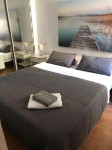 Postel nebo postele na pokoji v ubytování Apartamento Zahara de los Atunes- Atlanterra Costa + 13 fotografií