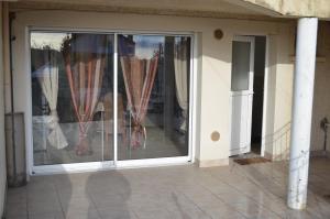 Balkón nebo terasa v ubytování Bel appartement type maison