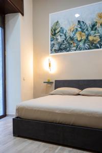 Ένα ή περισσότερα κρεβάτια σε δωμάτιο στο Stella Mia Luxury Rooms