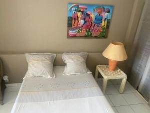 Postel nebo postele na pokoji v ubytování Studio confortable avec vue sur la mer