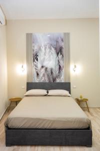 Ένα ή περισσότερα κρεβάτια σε δωμάτιο στο Stella Mia Luxury Rooms