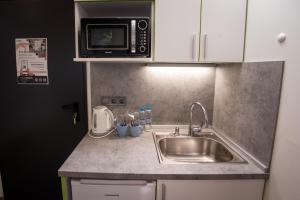 Una cocina o kitchenette en DORM BG pet-friendly Aparthotel